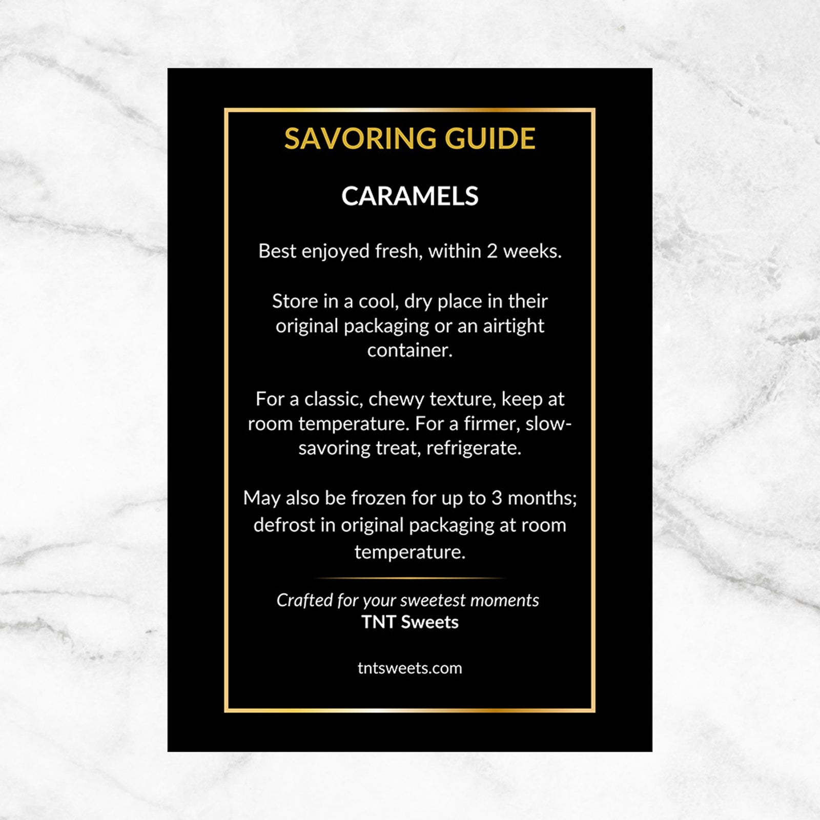 Care instructions for caramels on a black and gold card on a white marble background.