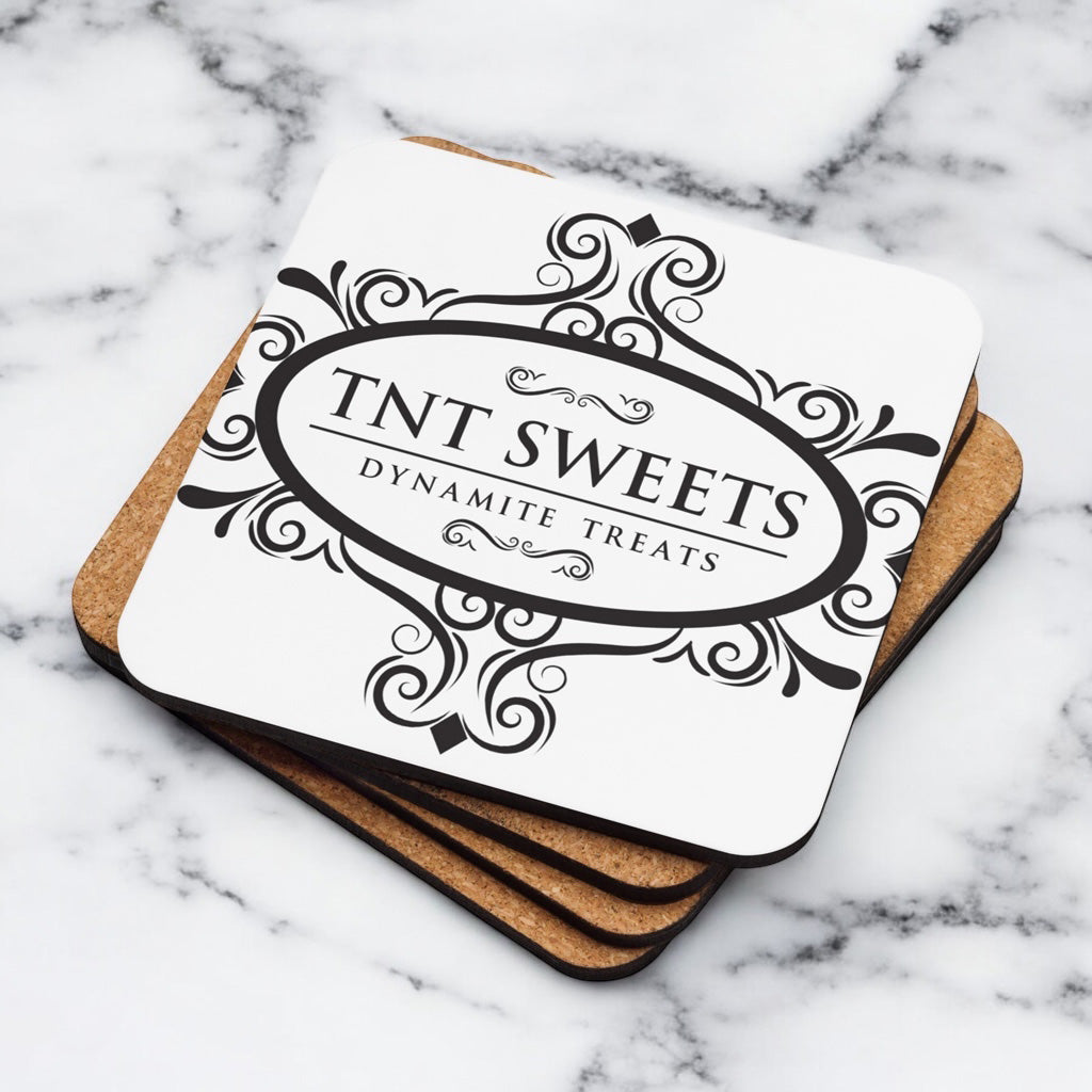 Stack of four white coasters with a black logo with a marble background.