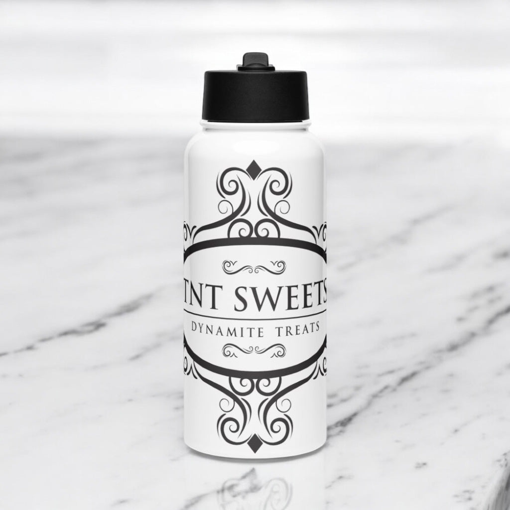 Classic white water bottle with black logo on a marble countertop with.