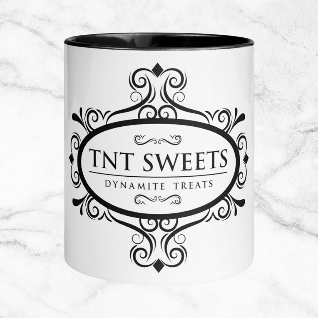 Classic white 11oz ceramic mug with a black logo on a white marble countertop.