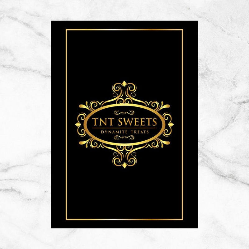 Reverse side of the TNT Sweets Caramels Savoring Guide featuring the TNT Sweets signature logo within a gold border, displayed on a white marble surface.