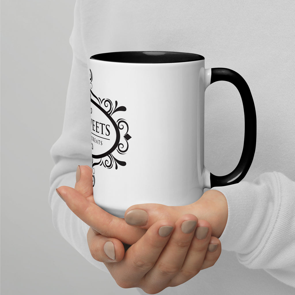 Model holding classic white 15oz ceramic mug with a white background.