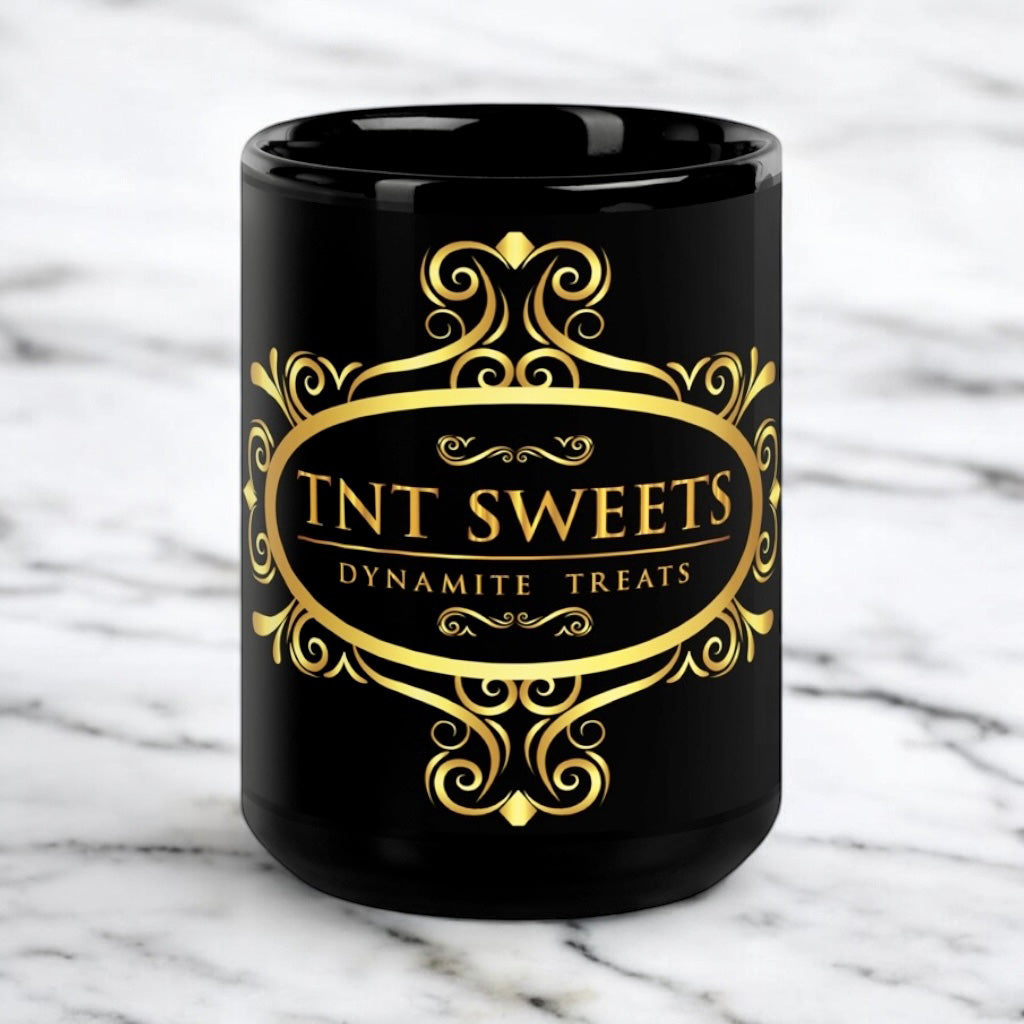 Black 15oz ceramic mug with a black logo on a white marble countertop.