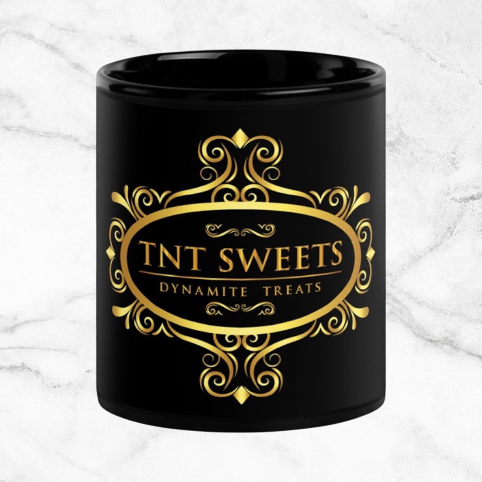 Black 11oz ceramic mug on white marble background.