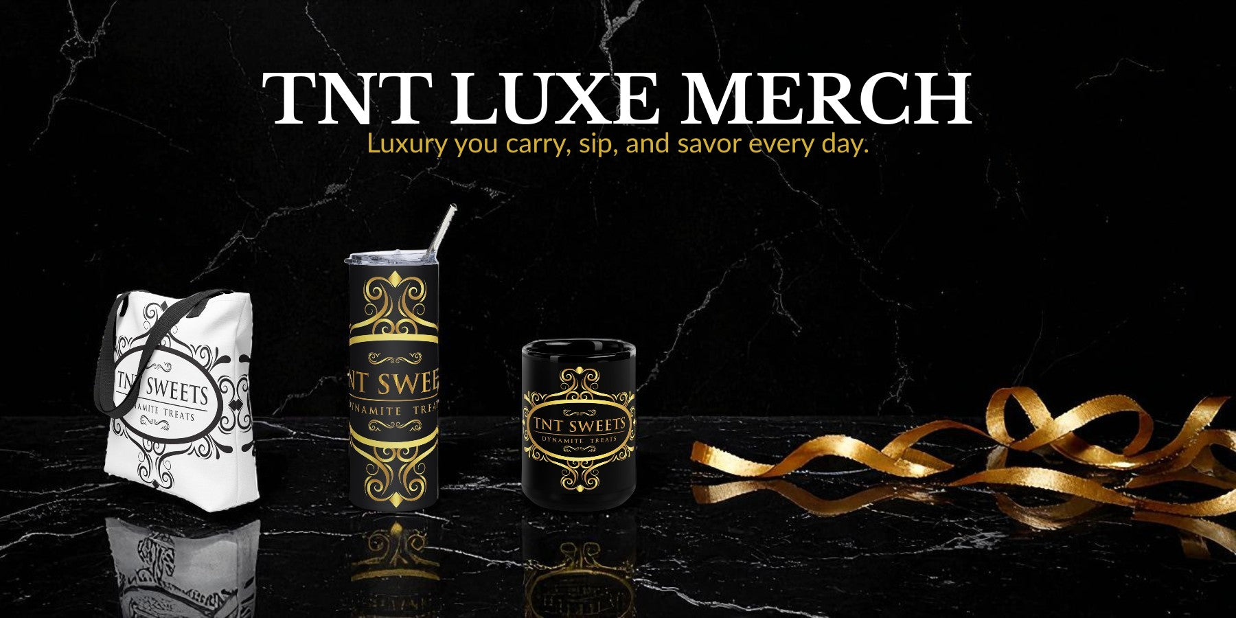 TNT Luxe Merch products on a black marble surface with gold ribbon