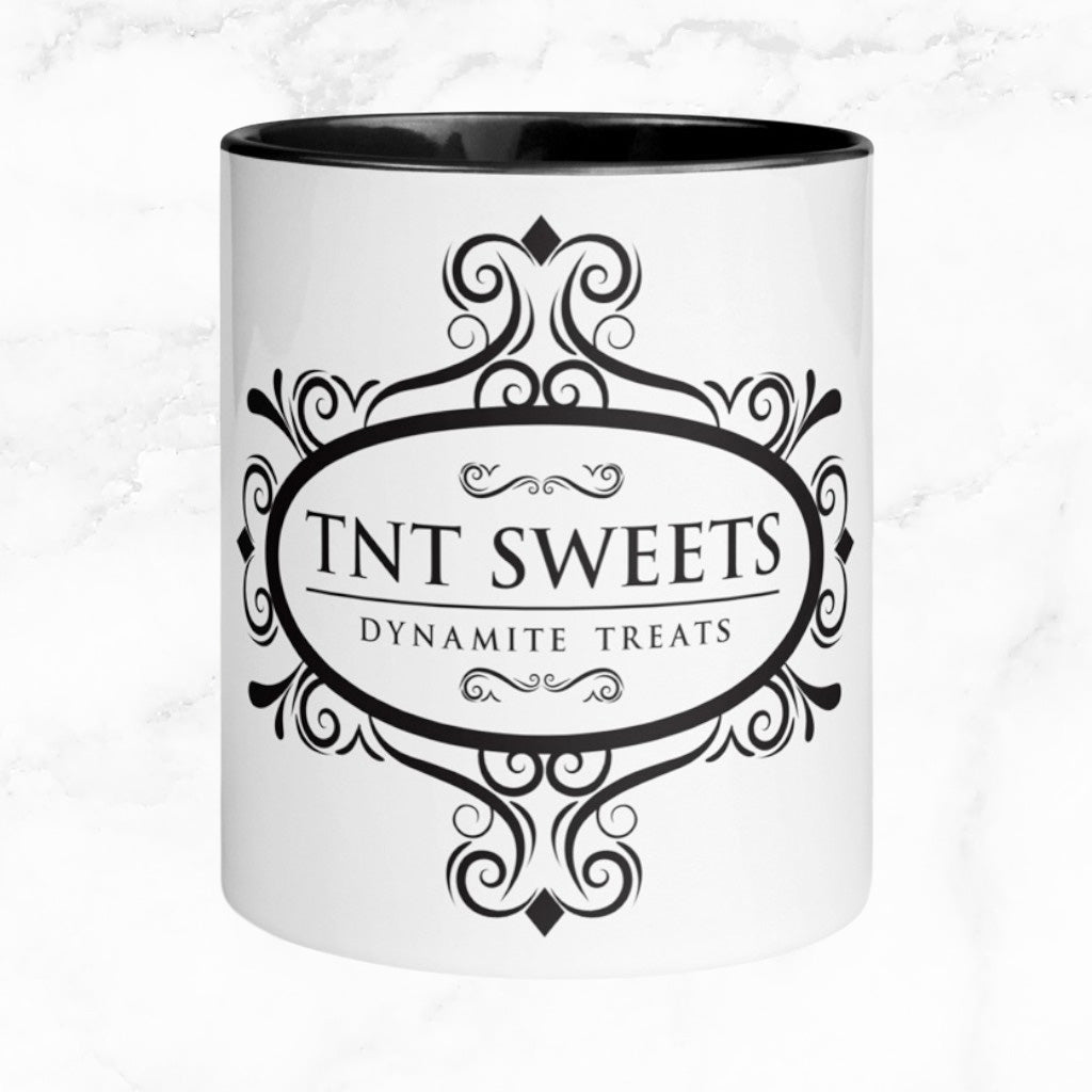 Classic white 11oz ceramic mug with a black logo on a white marble countertop.