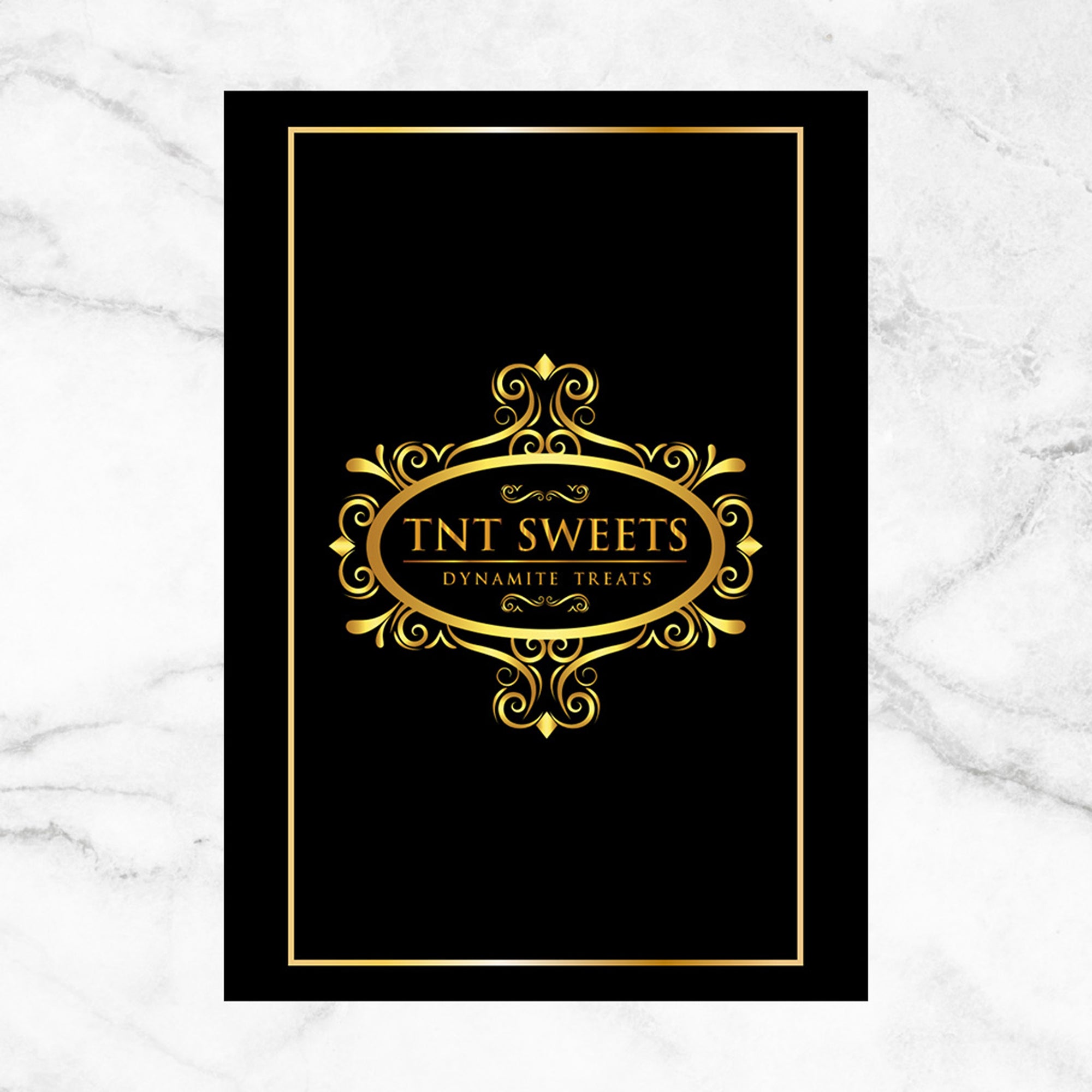 Backside of black cookie savoring guide insert on a white marble background. 