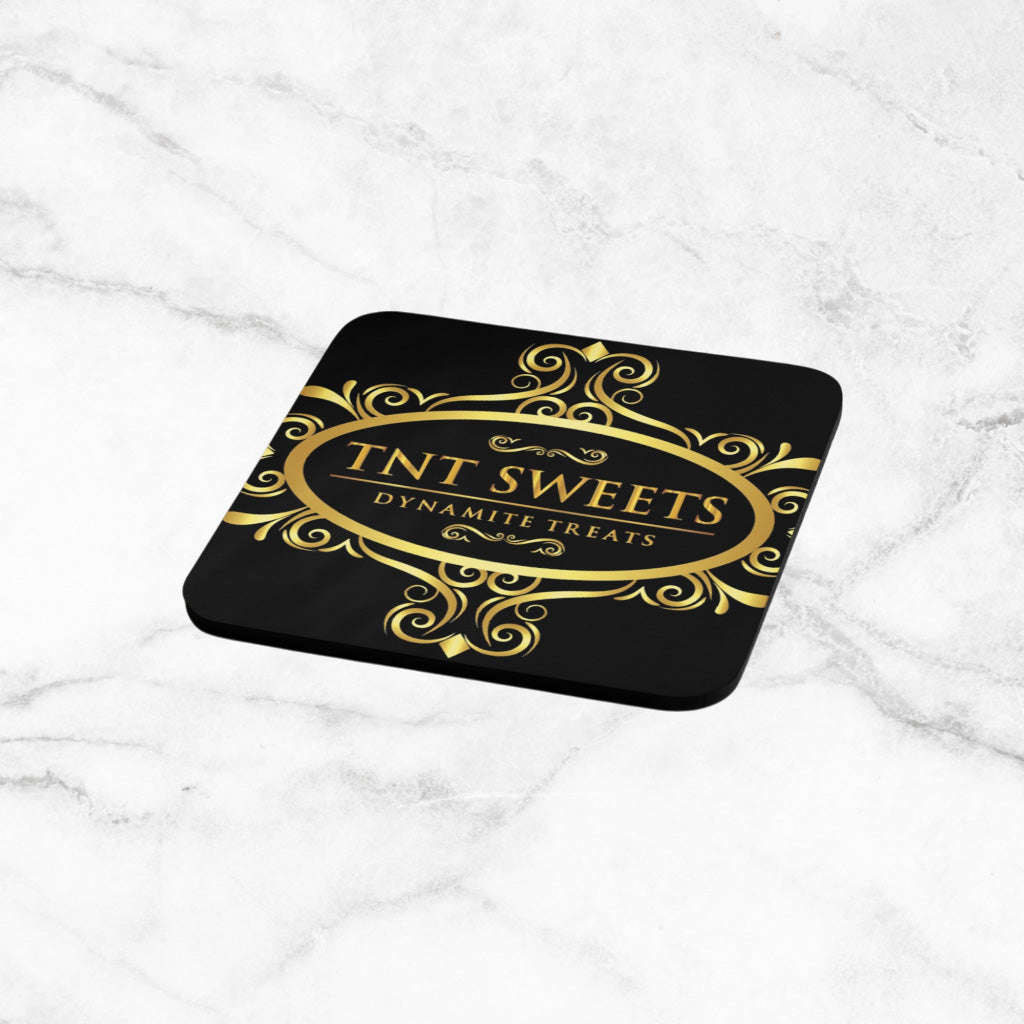 Black coaster with black and logo with a marble background.