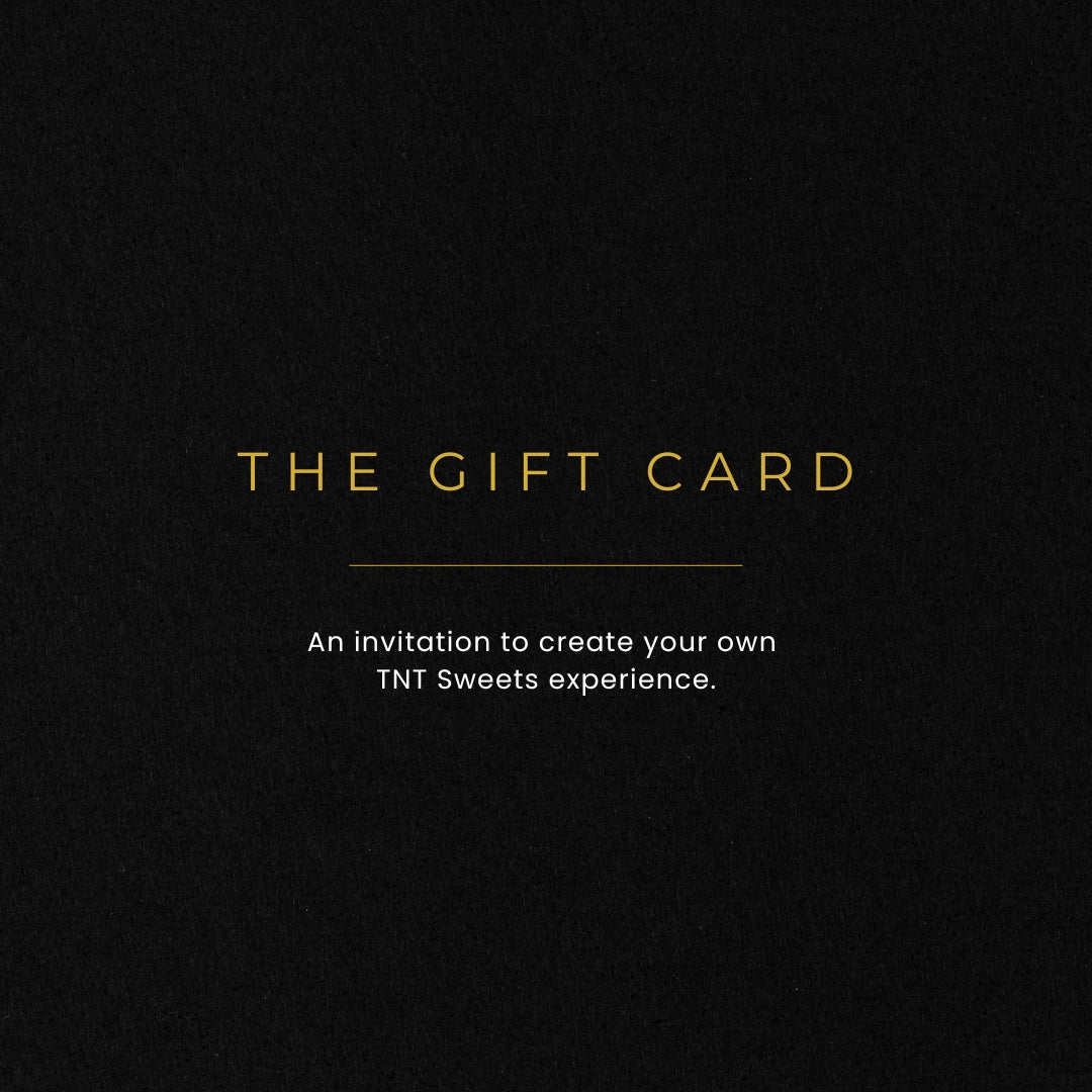 Black gift card with gold text inviting to create a TNT Sweets experience