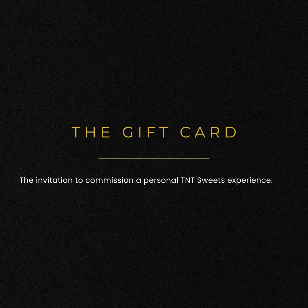 Black background with gold text 'THE GIFT CARD' and description below on a black background