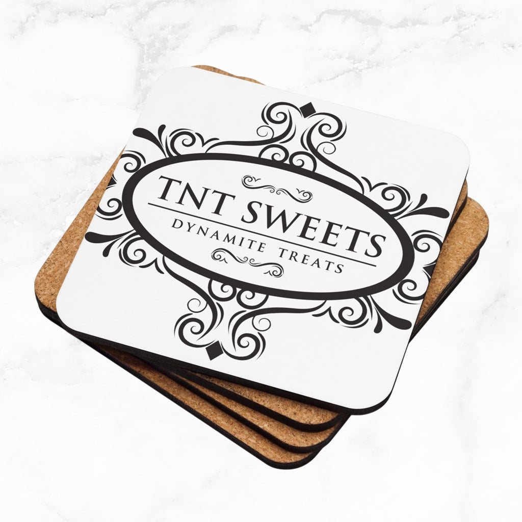 Stack of four white coasters with a black logo with a marble background.