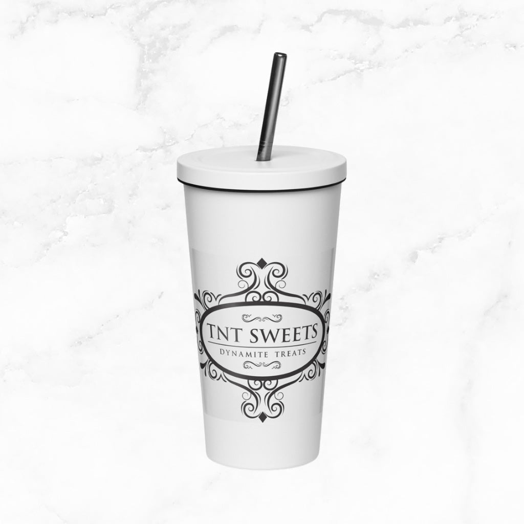 Signature white tumbler with black logo on white marble countertop.